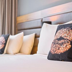 Kamer met een Queen Size Bed